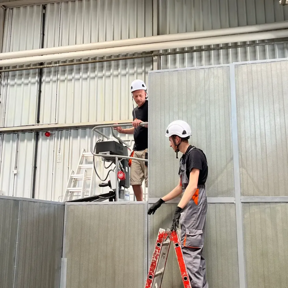 Soundproof enclosure in a railway tracks plant