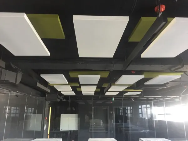 Acoustic treatment with hanging acoustic baffles of the New Bulgarian University, Sofia